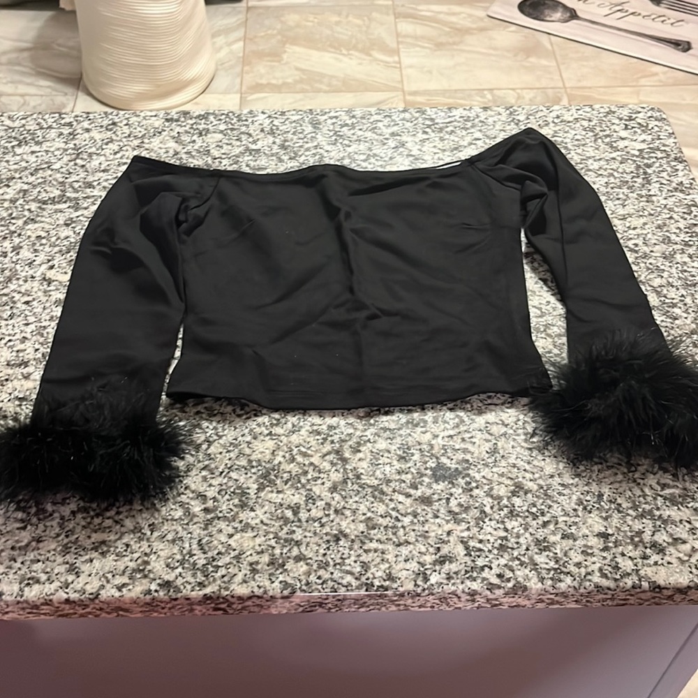 Black off the shoulder feather sleeve crop top